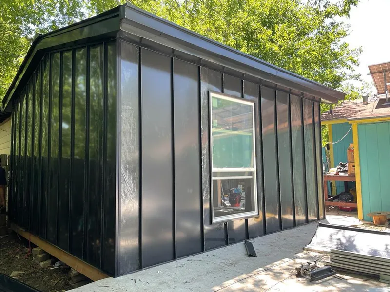 Black standing seam metal wall panels for Roof Inspection in Marshall